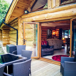 Two Night Stay in a Log Cabin at Badgers Wood, Hoo Zoo and Dinosaur World - Red by Find Me A Gift
