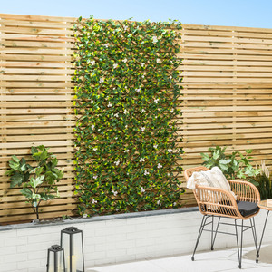 Expanding Artificial Trellis with Flowers - White by Christow