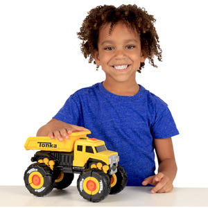 The CLAW Light and Sound Dump Truck - Bright yellow by Tonka
