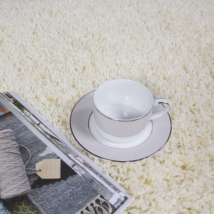 Soft Value Natural Cream Shaggy Area Rug by The Rug House