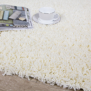 Soft Value Natural Cream Shaggy Area Rug by The Rug House