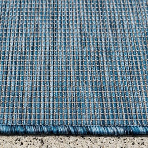 Navy Blue Soft Plastic Value Indoor Outdoor Area Rug by The Rug House