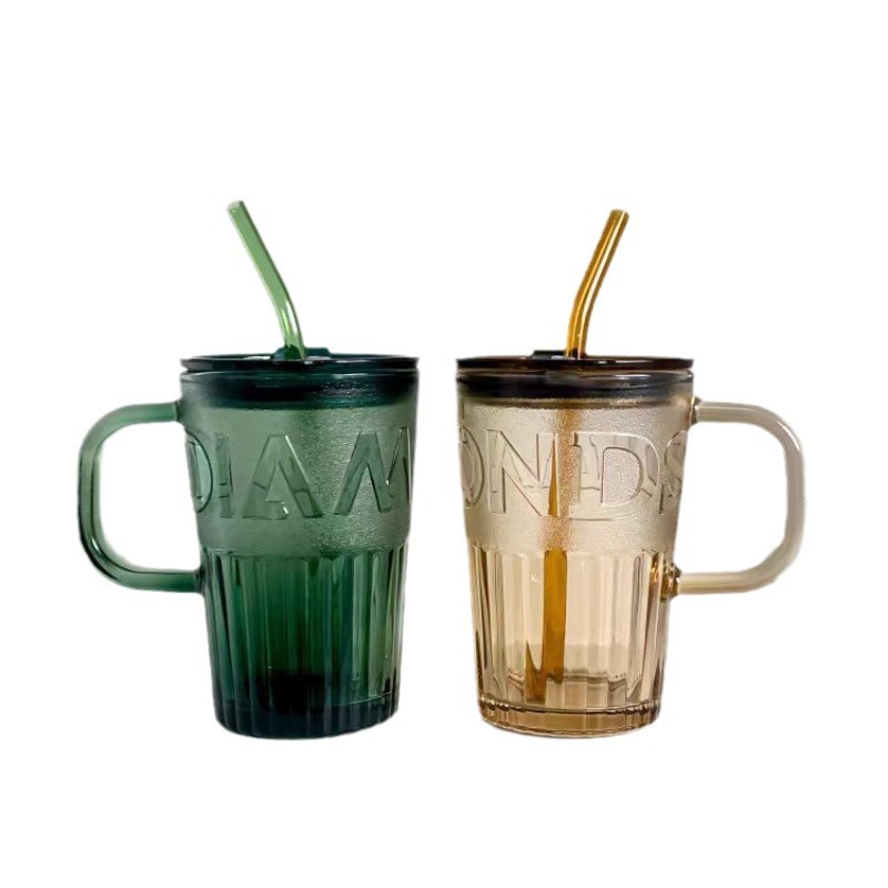 Glass cup with lid and straw
