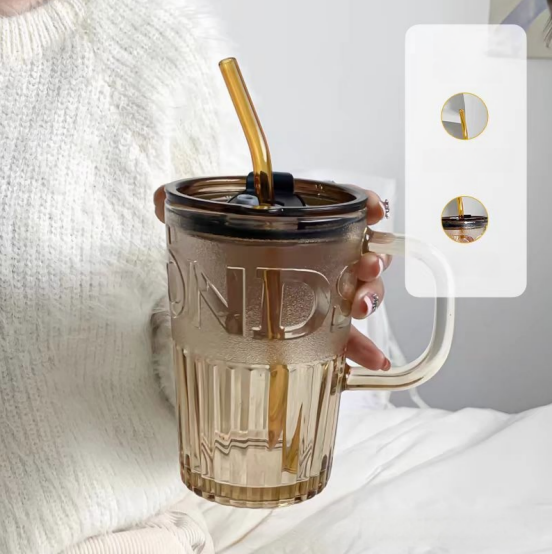 Glass cup with lid and straw