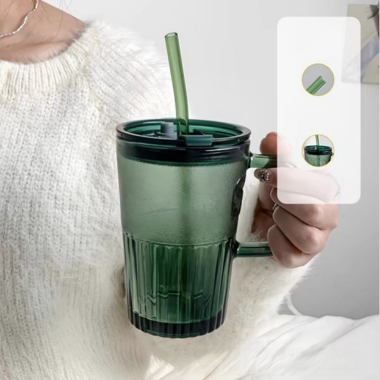 Glass cup with lid and straw