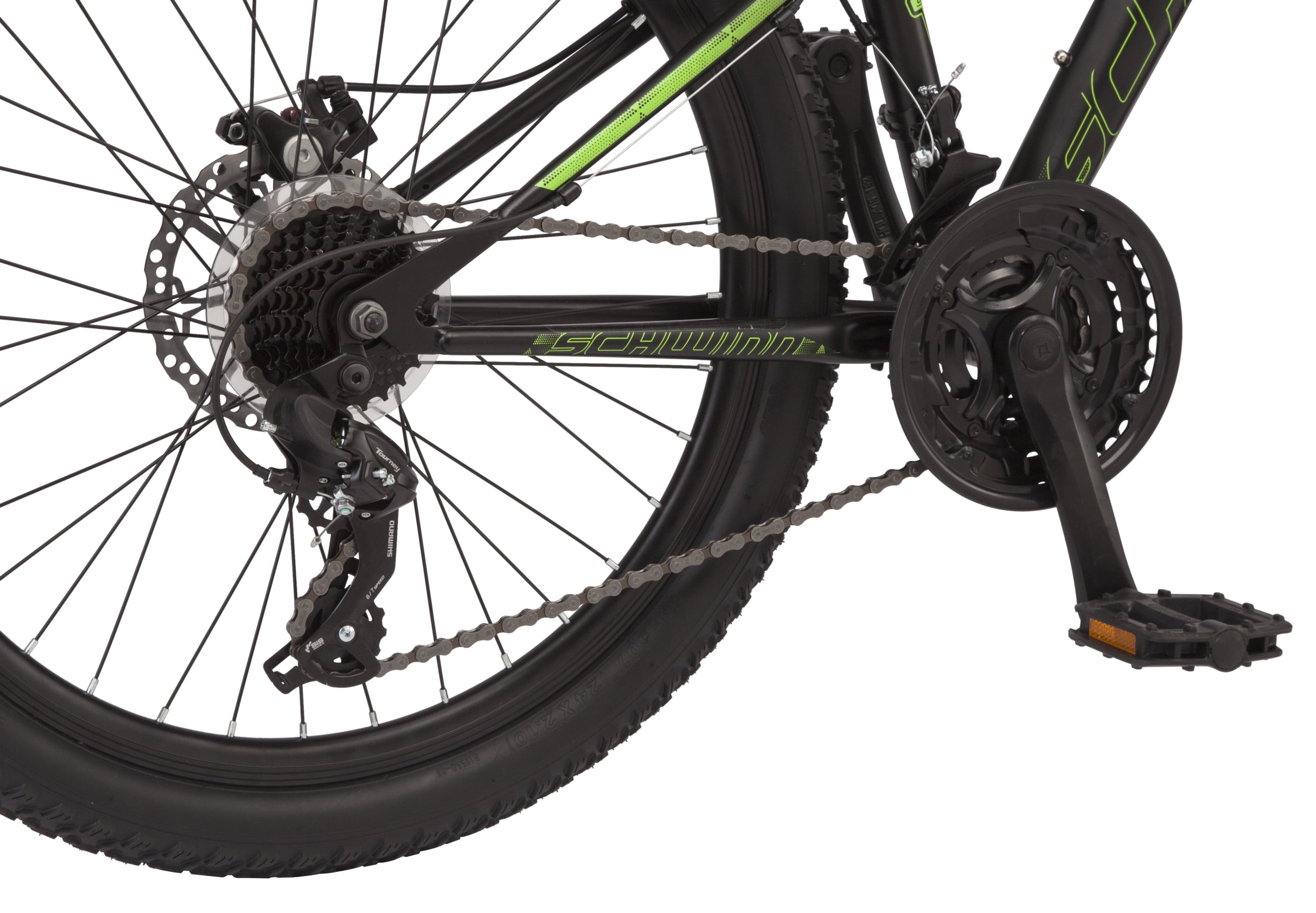 Sidewinder mountain bike. 24-inch wheels. 21 speeds. black / green