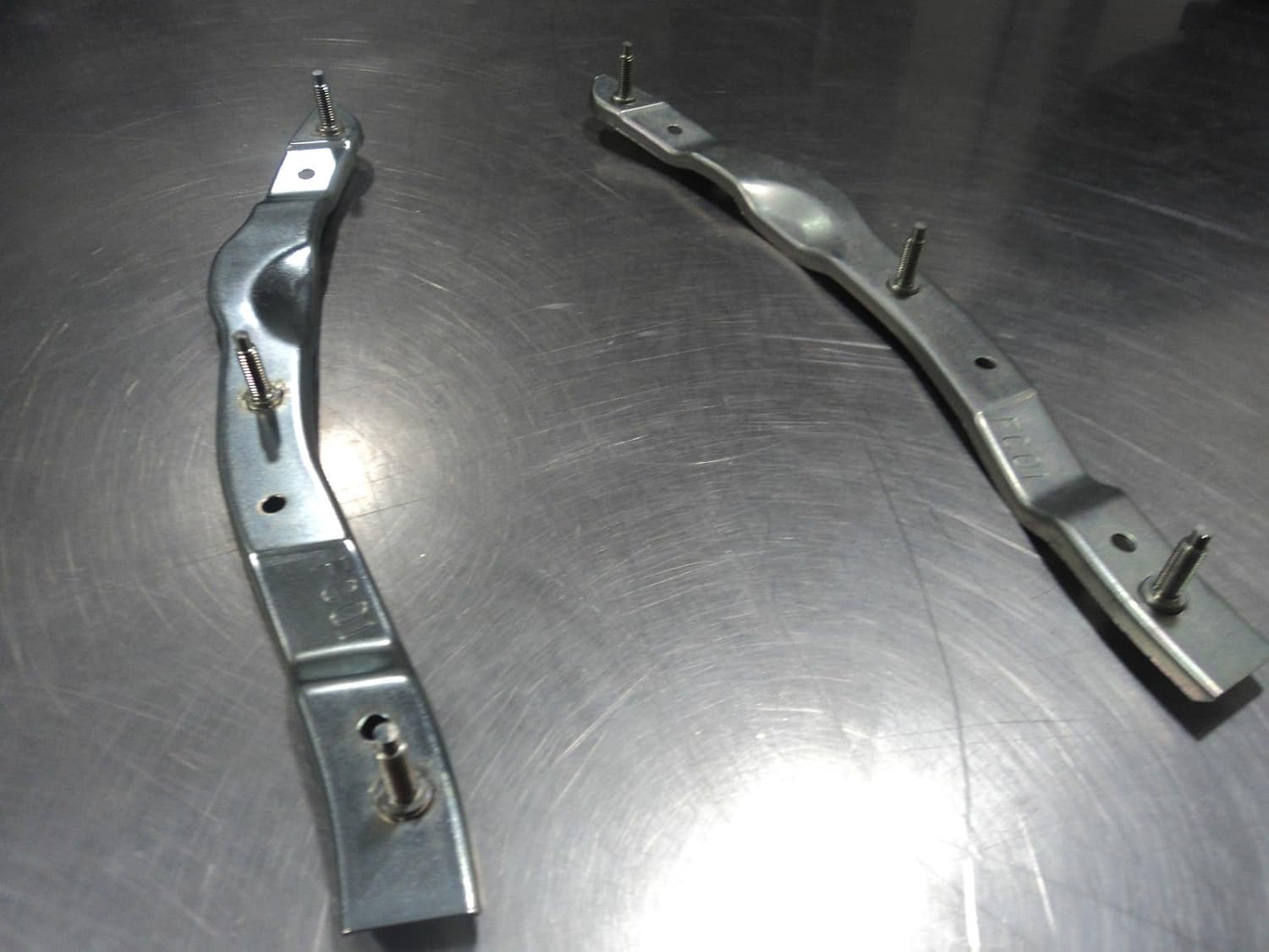 Mazda RX-7 1989-1992 New OEM front left and right bumper retainer bracket set Pack of 2