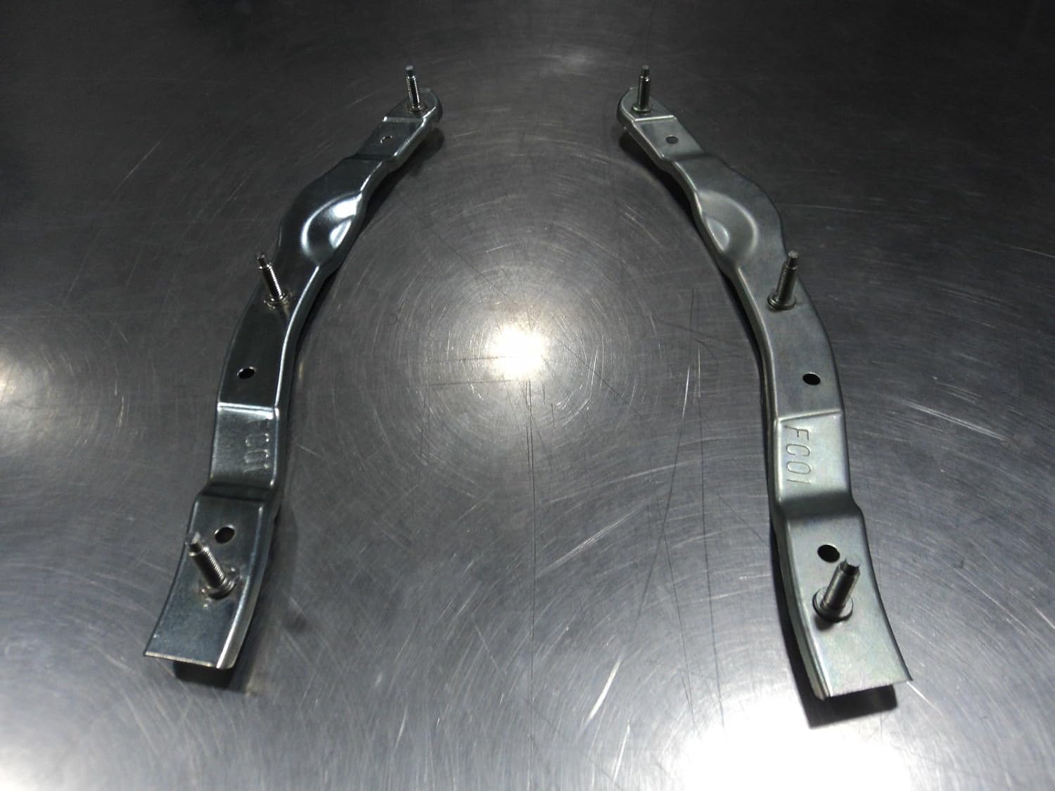 Mazda RX-7 1989-1992 New OEM front left and right bumper retainer bracket set Pack of 2