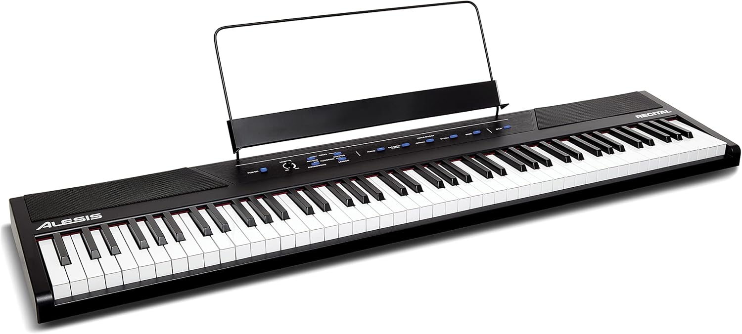 Alesis Recital – 88 Key Digital Piano Keyboard with Semi Weighted Keys, 2x20W Speakers, 5 Voices, Split, Layer and Lesson Mode, FX and Piano Lessons