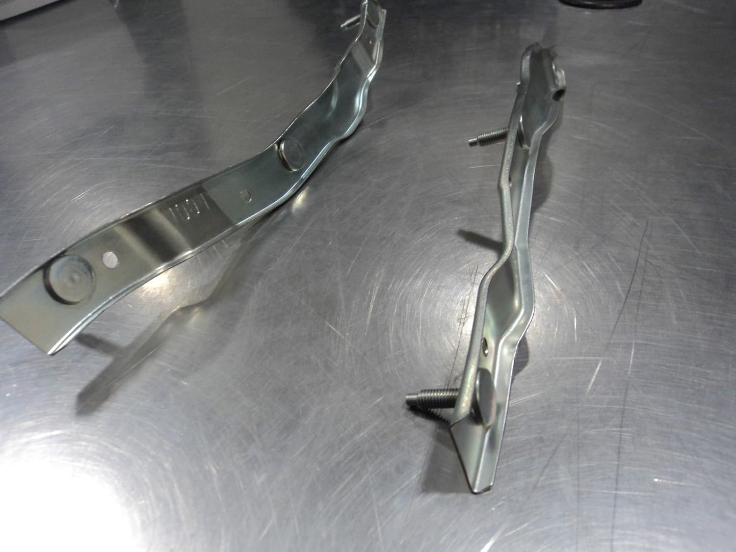 Mazda RX-7 1989-1992 New OEM front left and right bumper retainer bracket set Pack of 2