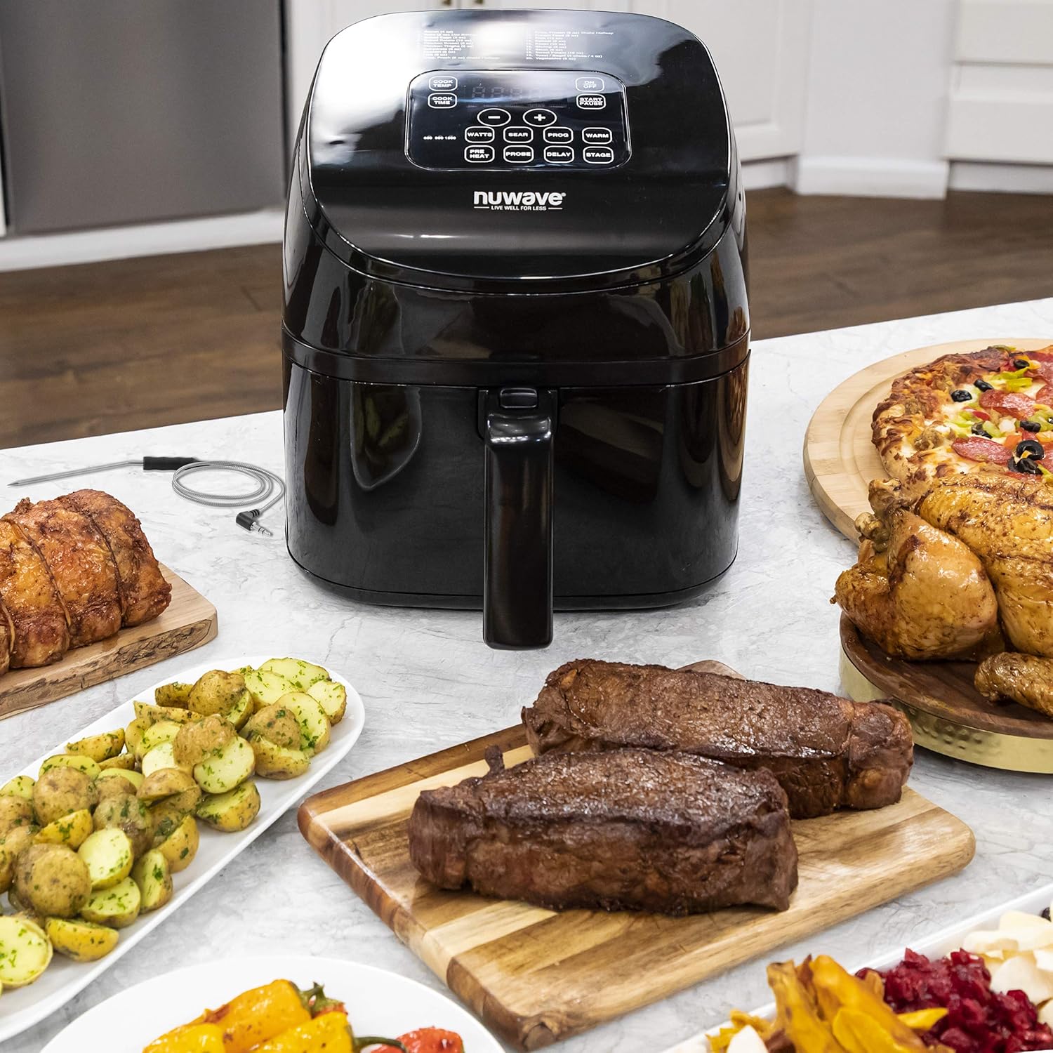 NUWAVE Brio 4.5-Quart Digital Air Fryer includes precise temperature control, one-touch digital controls, 6 easy presets, wattage control, recipe book, Nuwave Cooking Club App, and advanced functions like PREHEAT or REHEAT