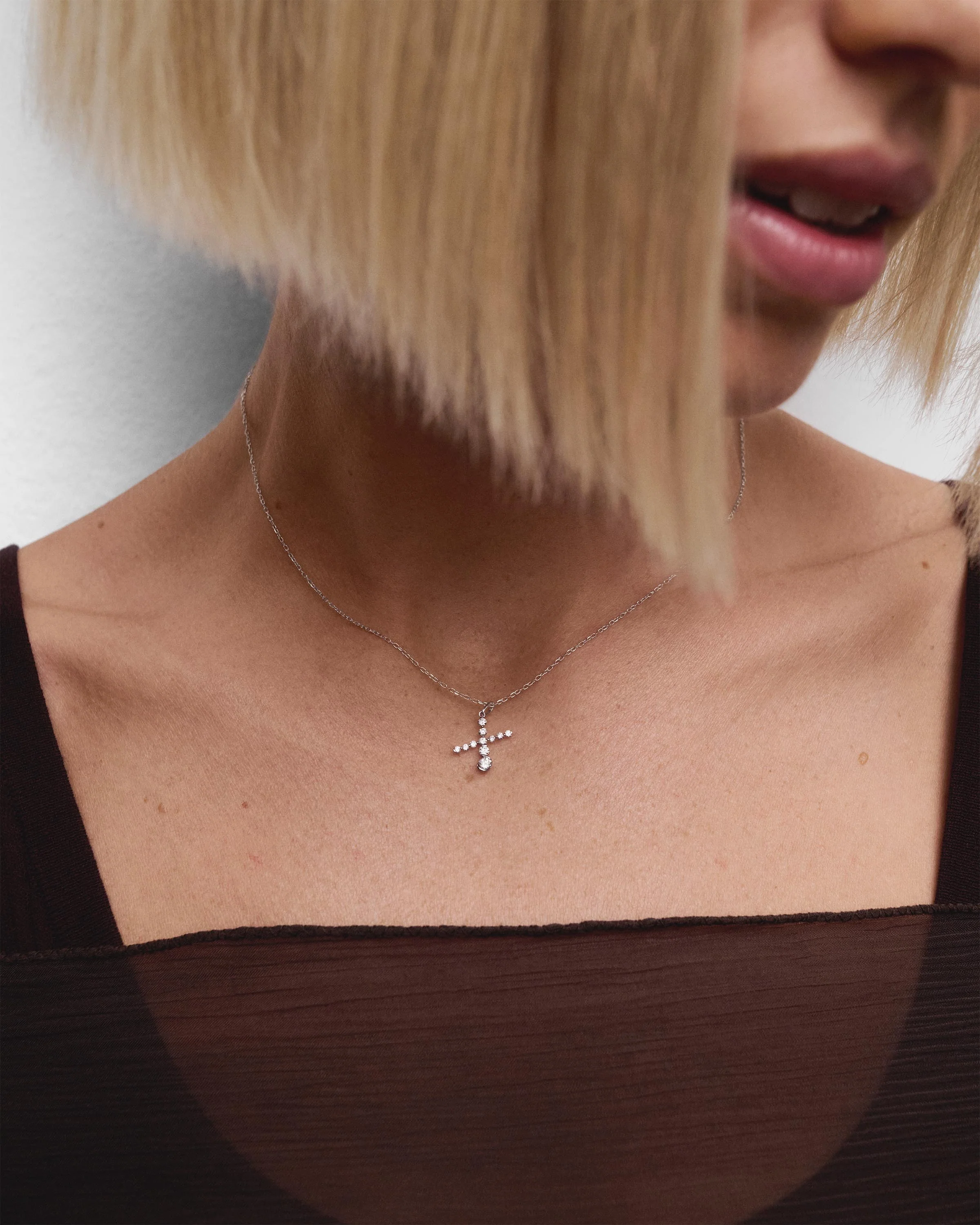 Diamonds and white gold X initial pendant