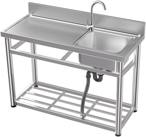 Practical stainless steel commercial kitchen sink with hot and cold pipes with countertops and shelves for bar, garage, dining room, laundry, garden, yard outdoors. (32