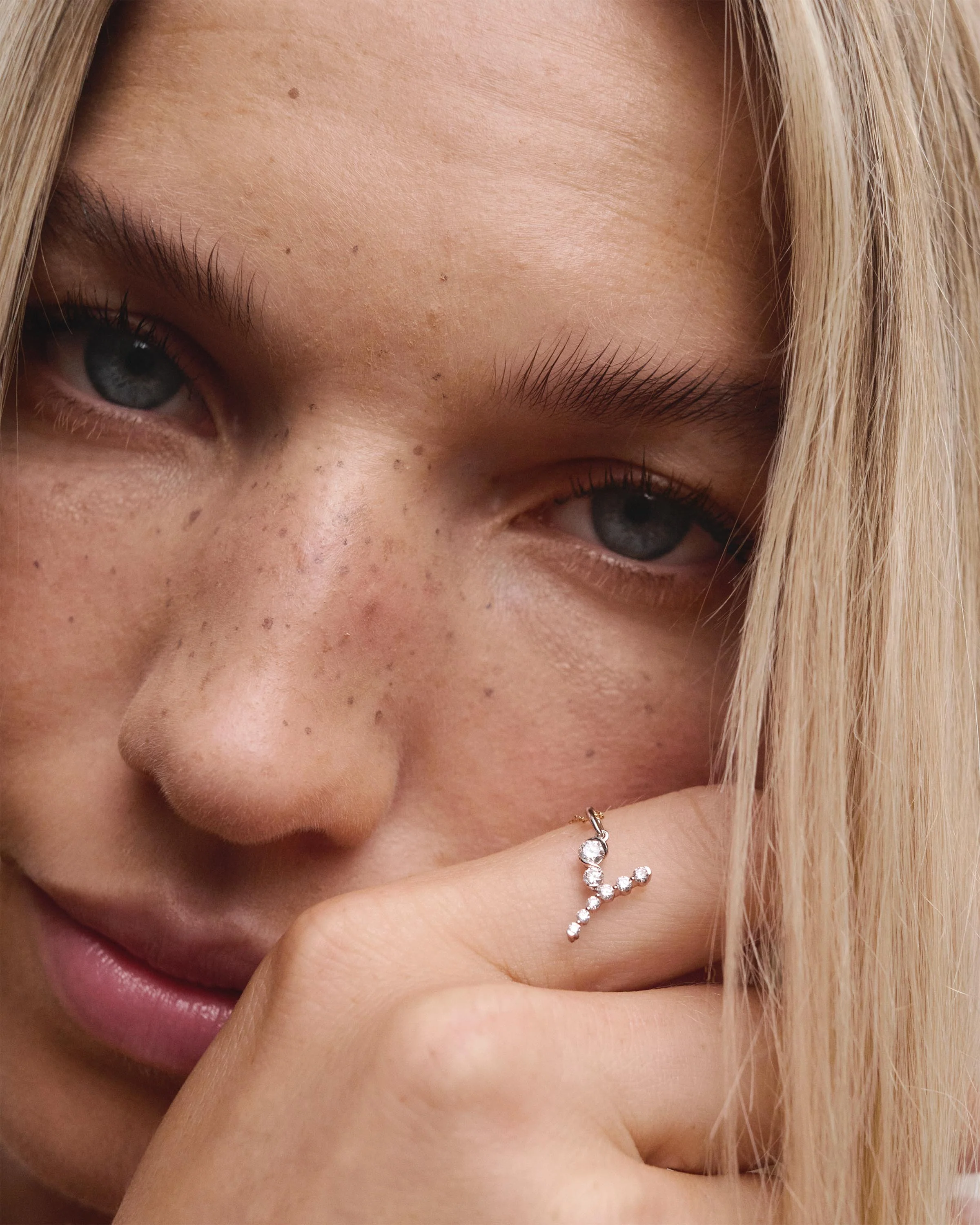 Diamonds and white gold Y initial pendant