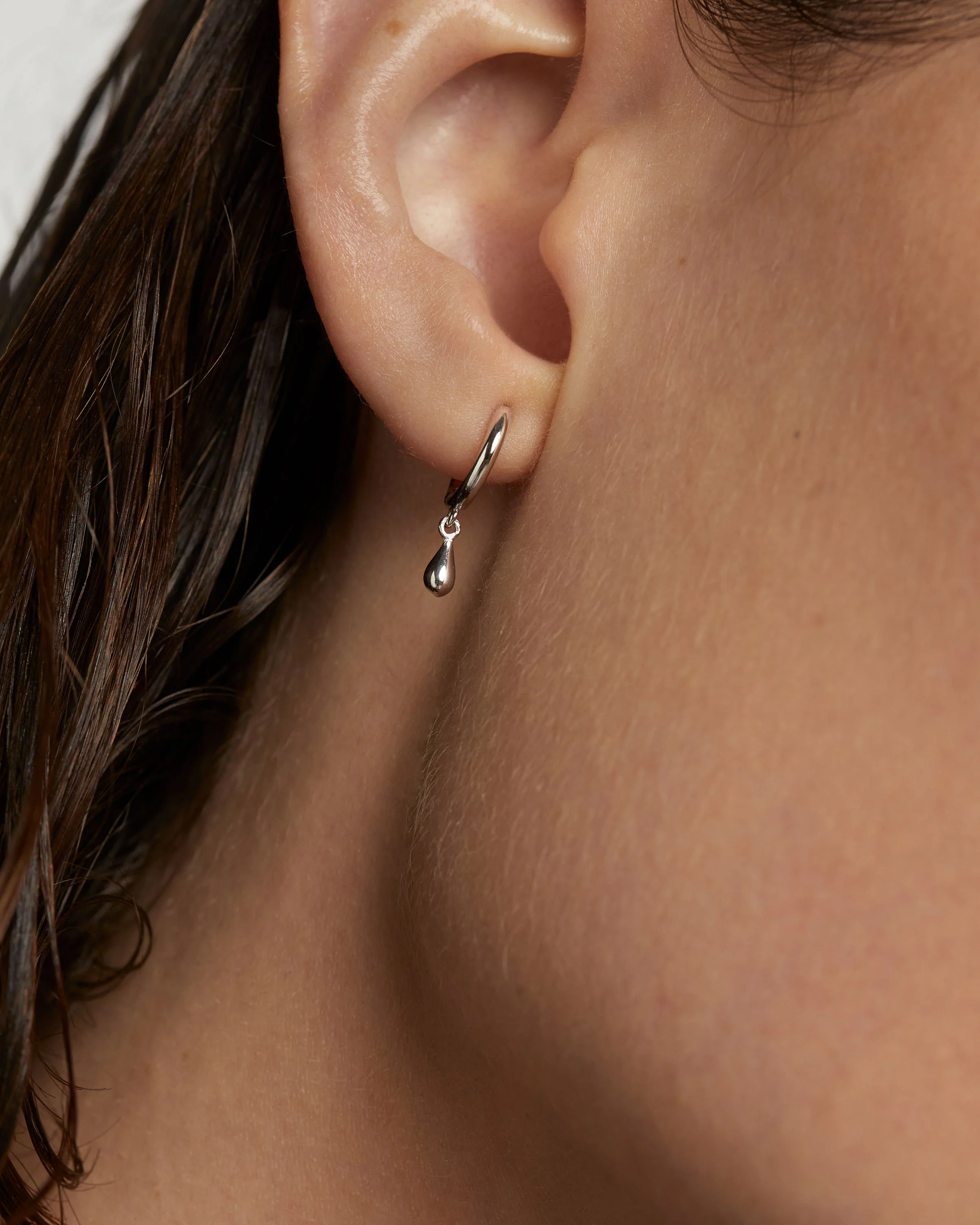 Teardrop silver single hoop Earring