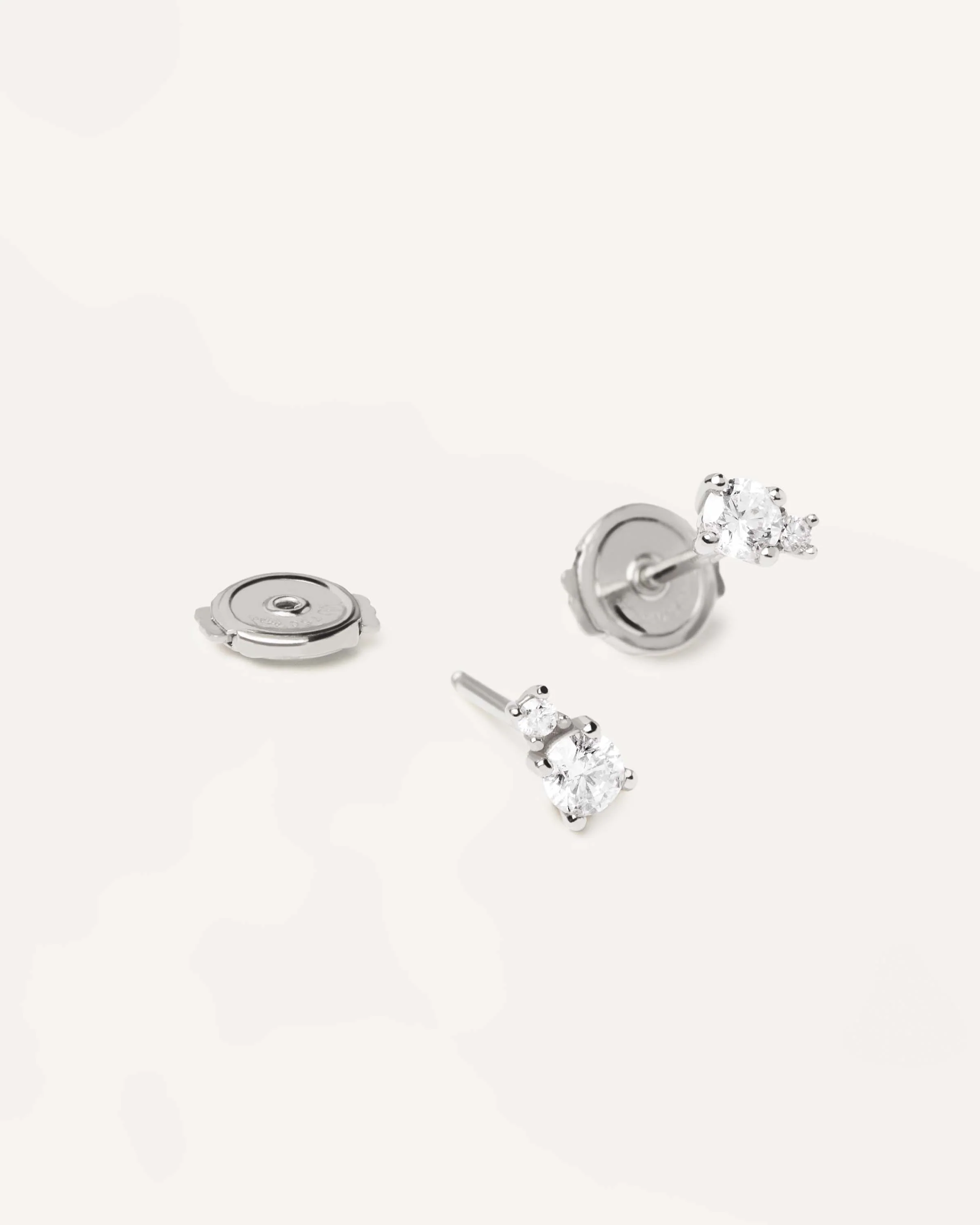Diamonds and White Gold Solitaire Duo Studs