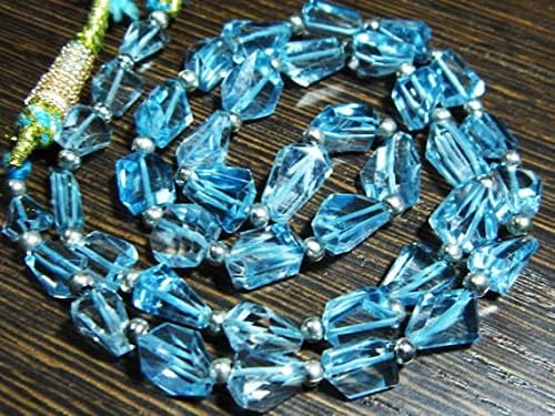 BEADS GEMSTONE 120 carat-AAA Blue Topaz Step Cut Nuggets- 17 Inch Long Strand -Stones measure- 7-11mm long. Code-HIGH-8016