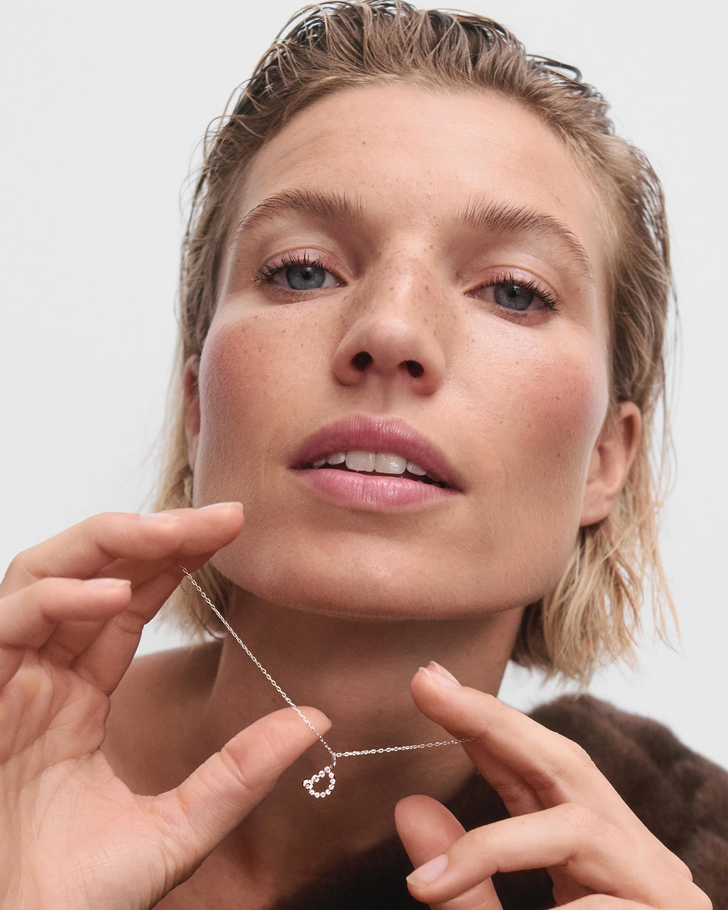 Diamonds and white gold D initial pendant