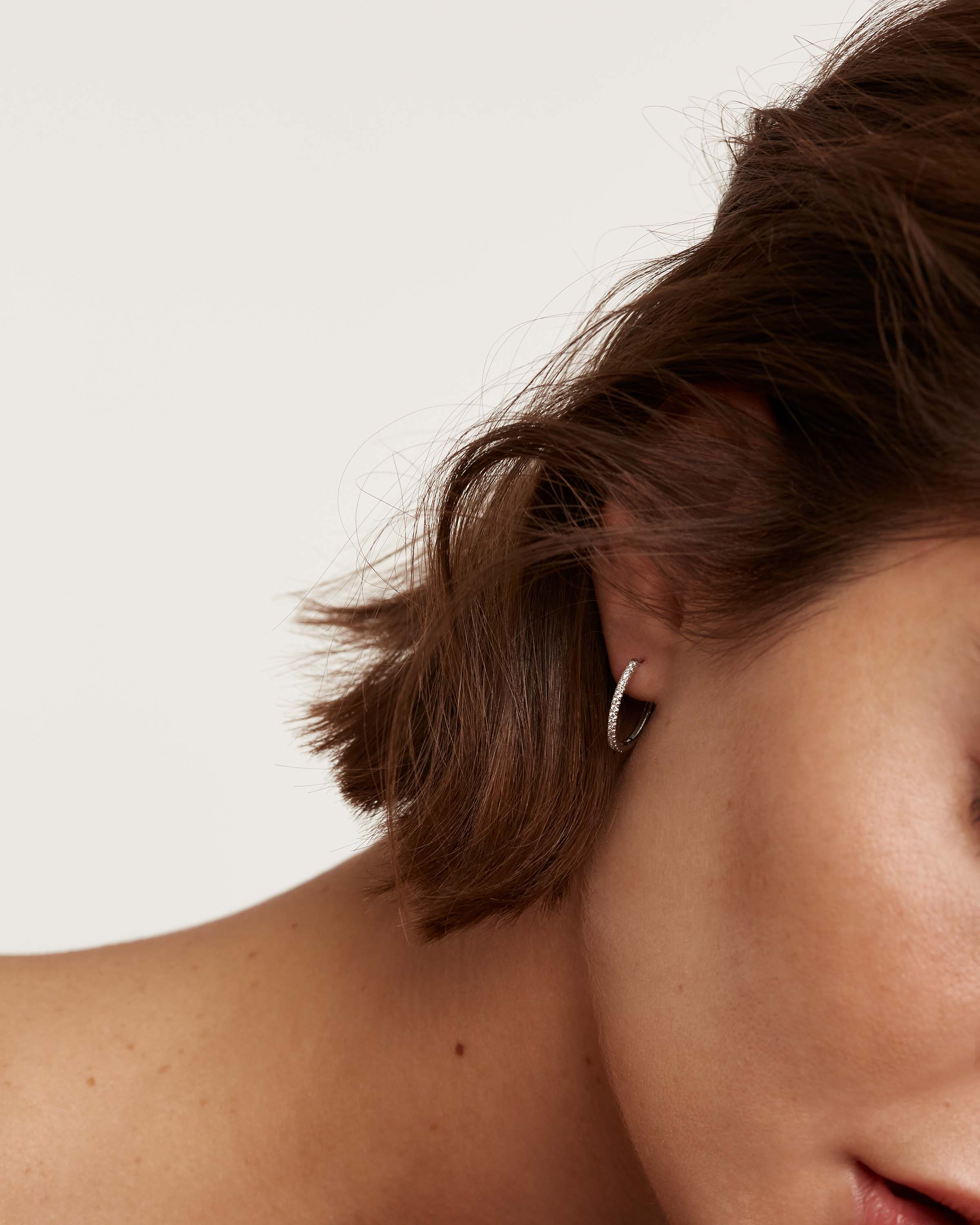 Diamonds and White Gold Eternity Medium Hoops