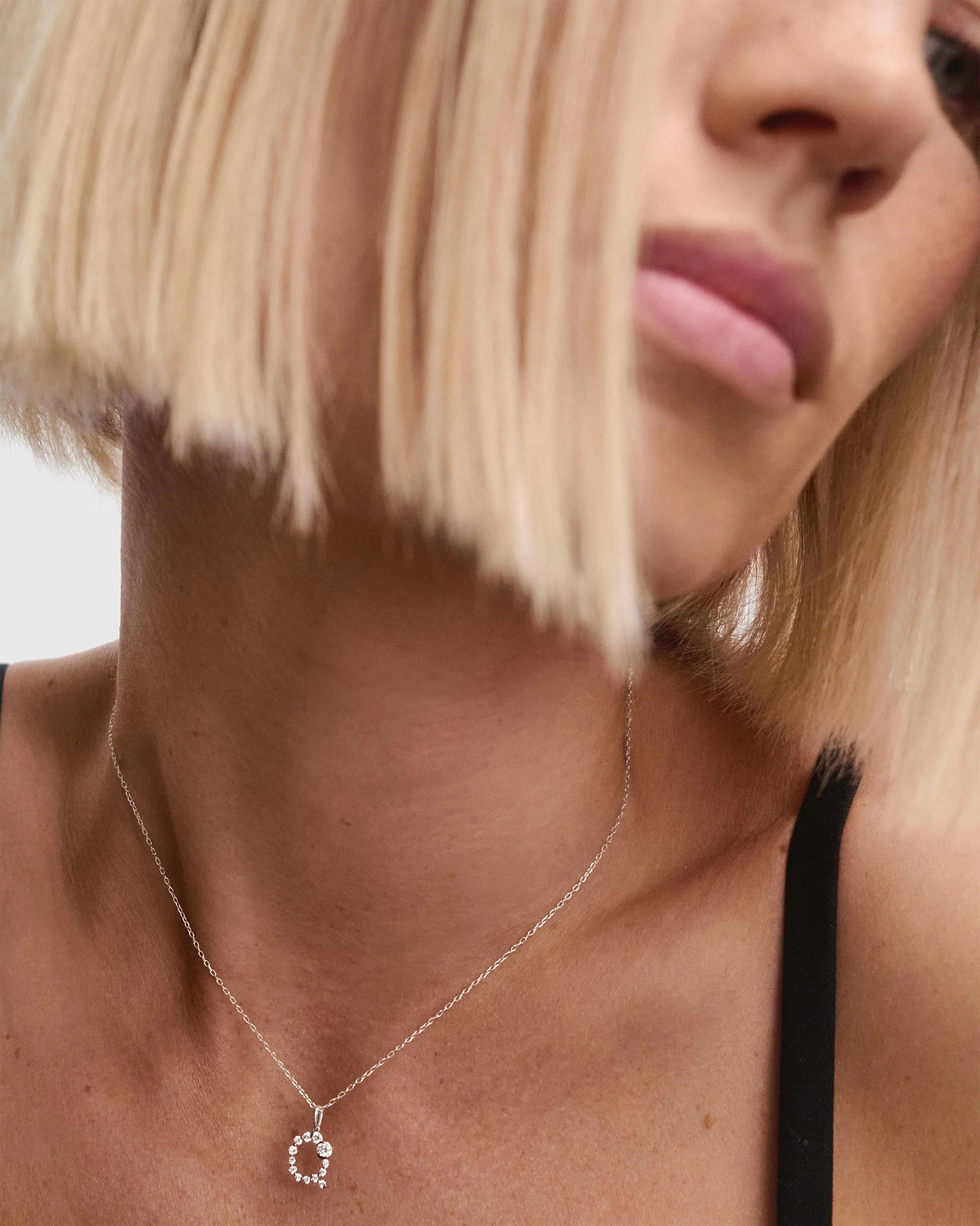 Diamonds and white gold Q initial pendant