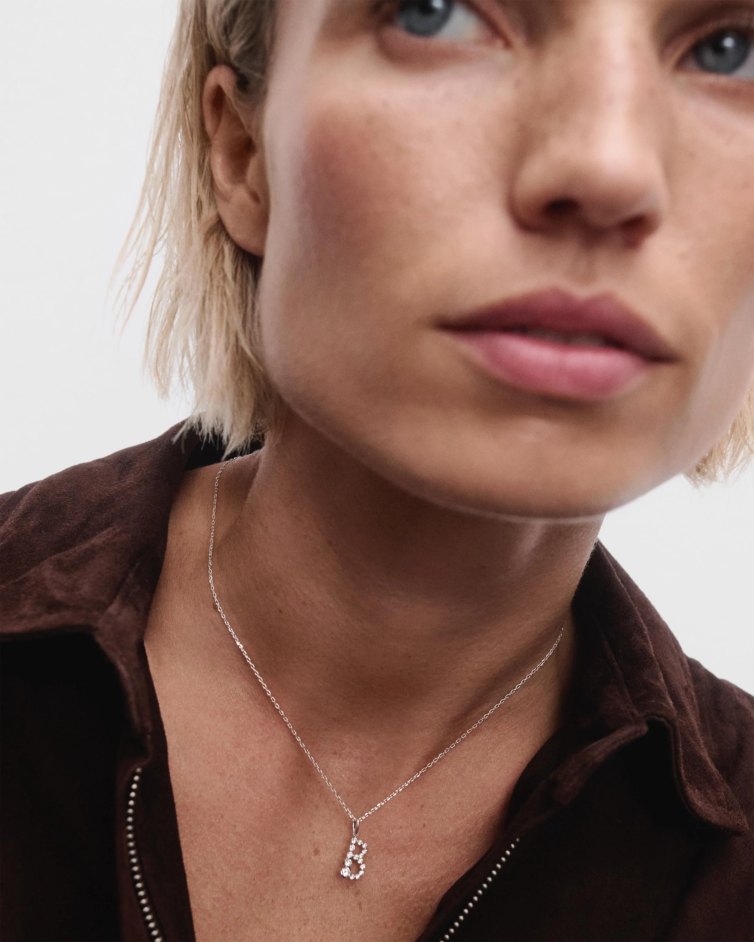Diamonds and white gold B initial pendant