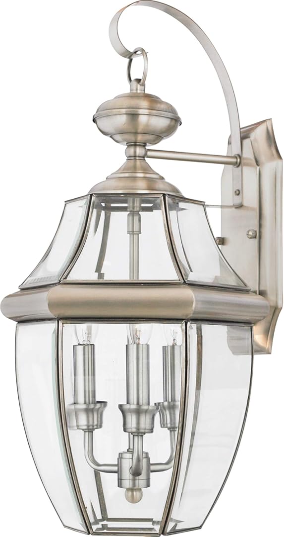 Quoizel Newbury Outdoor Wall Lantern, 23 Inch 3-Light Pewter Wall Sconce, French Country Exterior Wall Lantern Fixture, E12 Base, Clear Glass, Outside Lights for Patio, Porch, Garage or Yard