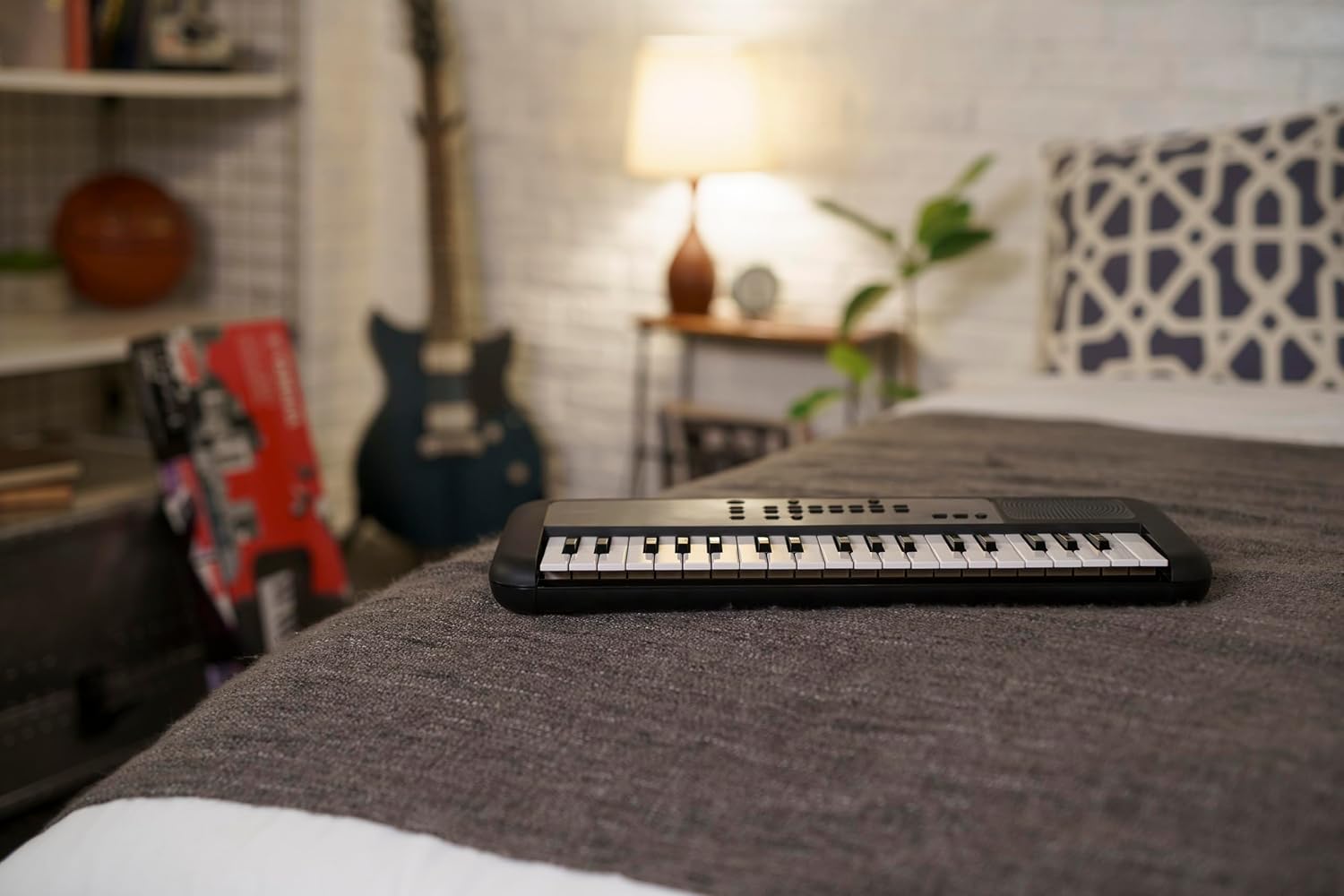 Yamaha 37-Mini Key Musical Keyboard Piano featuring Portable Design, 42 Instrument Voices, Phrase Recorder, Built-In Speakers, Battery Power, Black (PSS-A50)