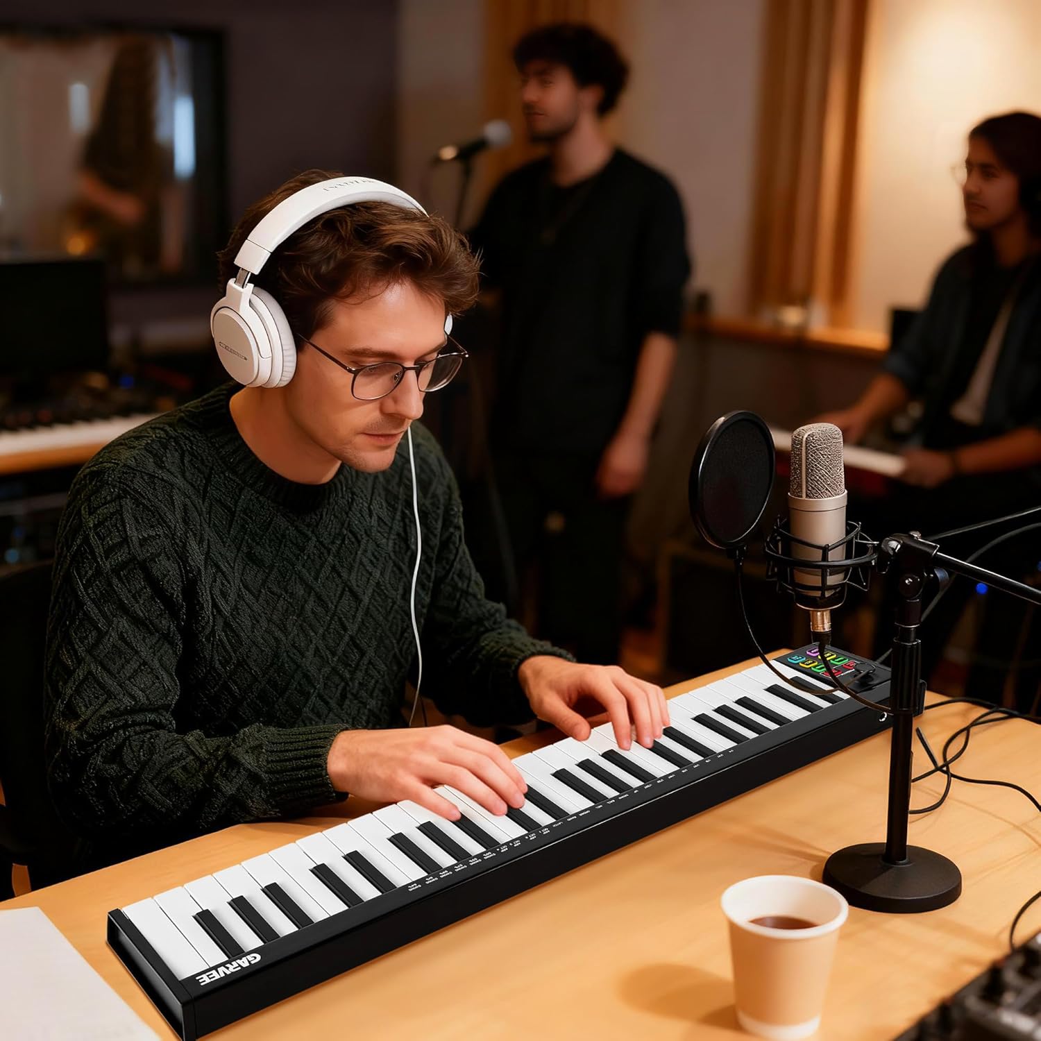 49-Key MIDI Keyboard Controller — Compact USB/DAW Integrated Keyboard with 8 Drum Pads, 8 Knobs & OLED Display. Ideal for Music Production.