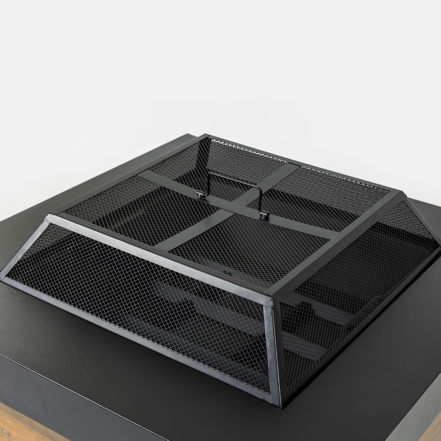 Black 36x24 inch Steel Fire Pit Table with Woven Pattern Detailing Durable Construction for All Weather Wood Burning Enjoyment