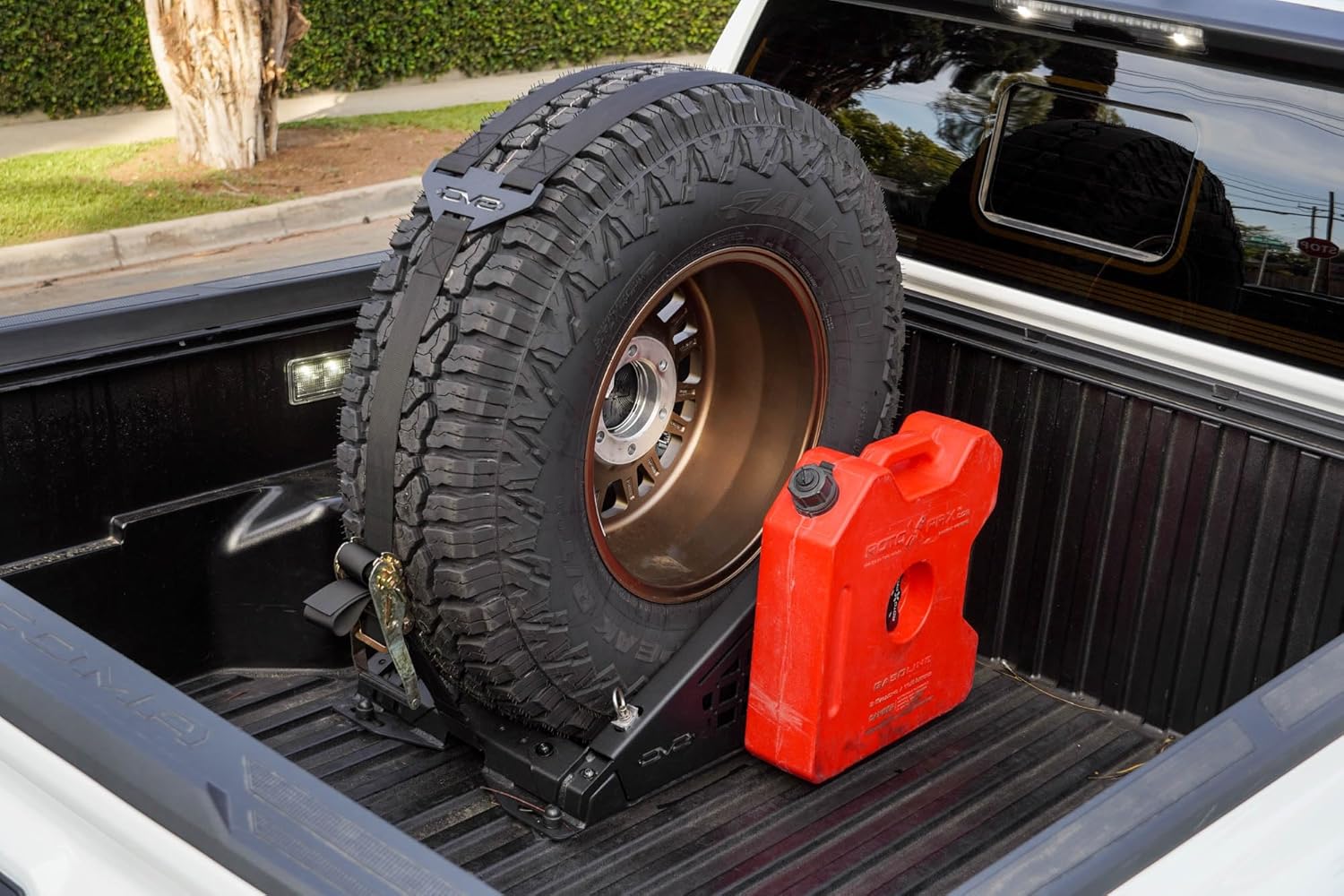 DV8 Offroad Truck Bed Universal Tire Carrier & Accessory Mount | Featured Side Molle Panels for Mounting Gear & Supplies | Adjustable for Carrying Various Sized Tires and Bikes | Powder Coated Finish
