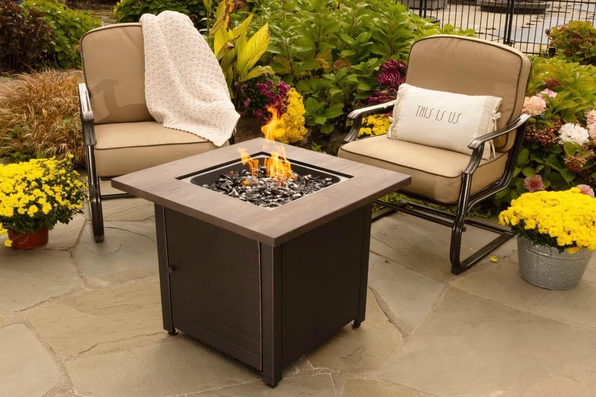 Endless Summer Bronze Finished Black Steel Base with Dark Wood Mantel Spencer LP Gas Outdoor Fire Pit, Comes with Black Fire Glass, Table Insert, and Protective Cover